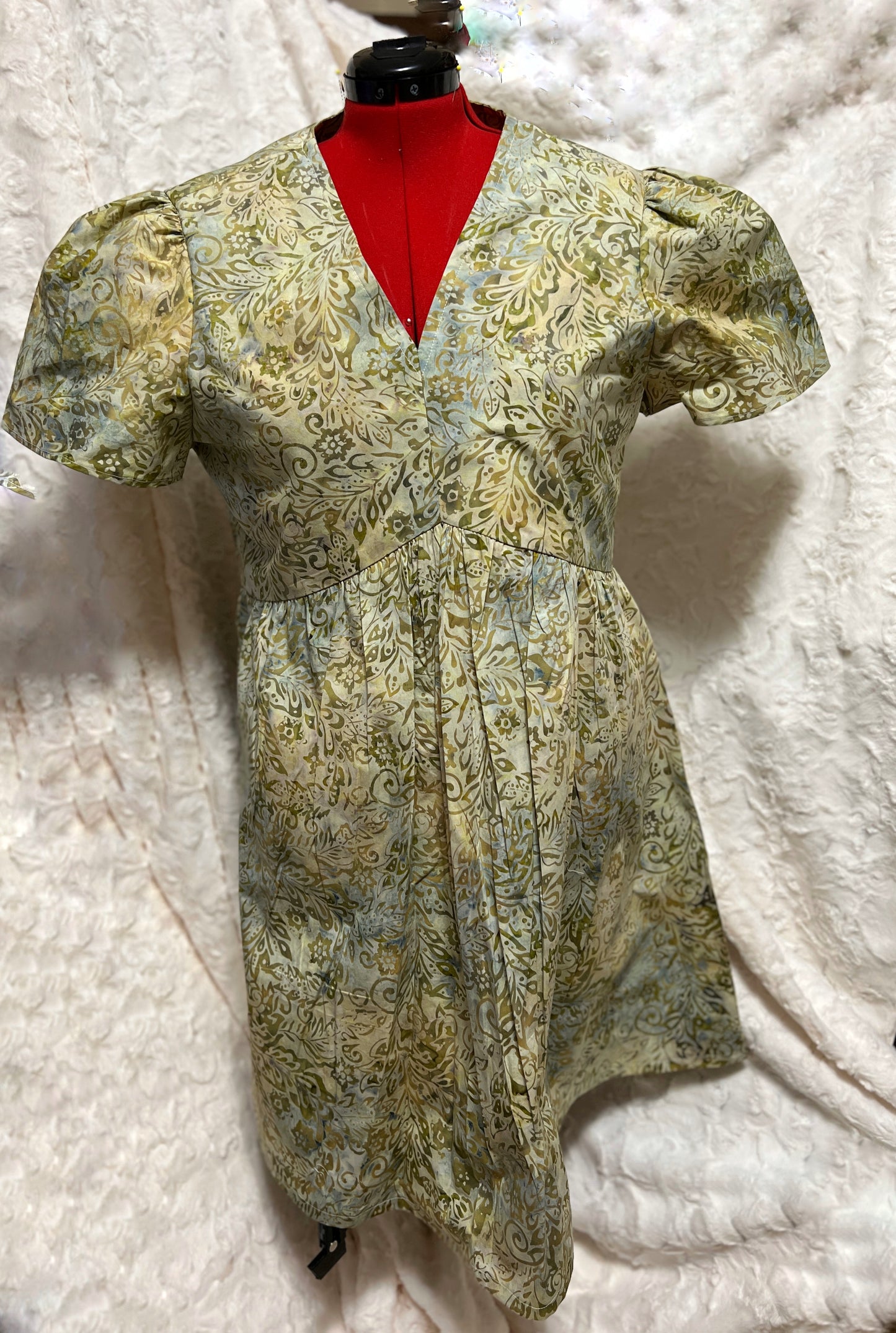 Batik V-neck dress handmade with French appliqué.
